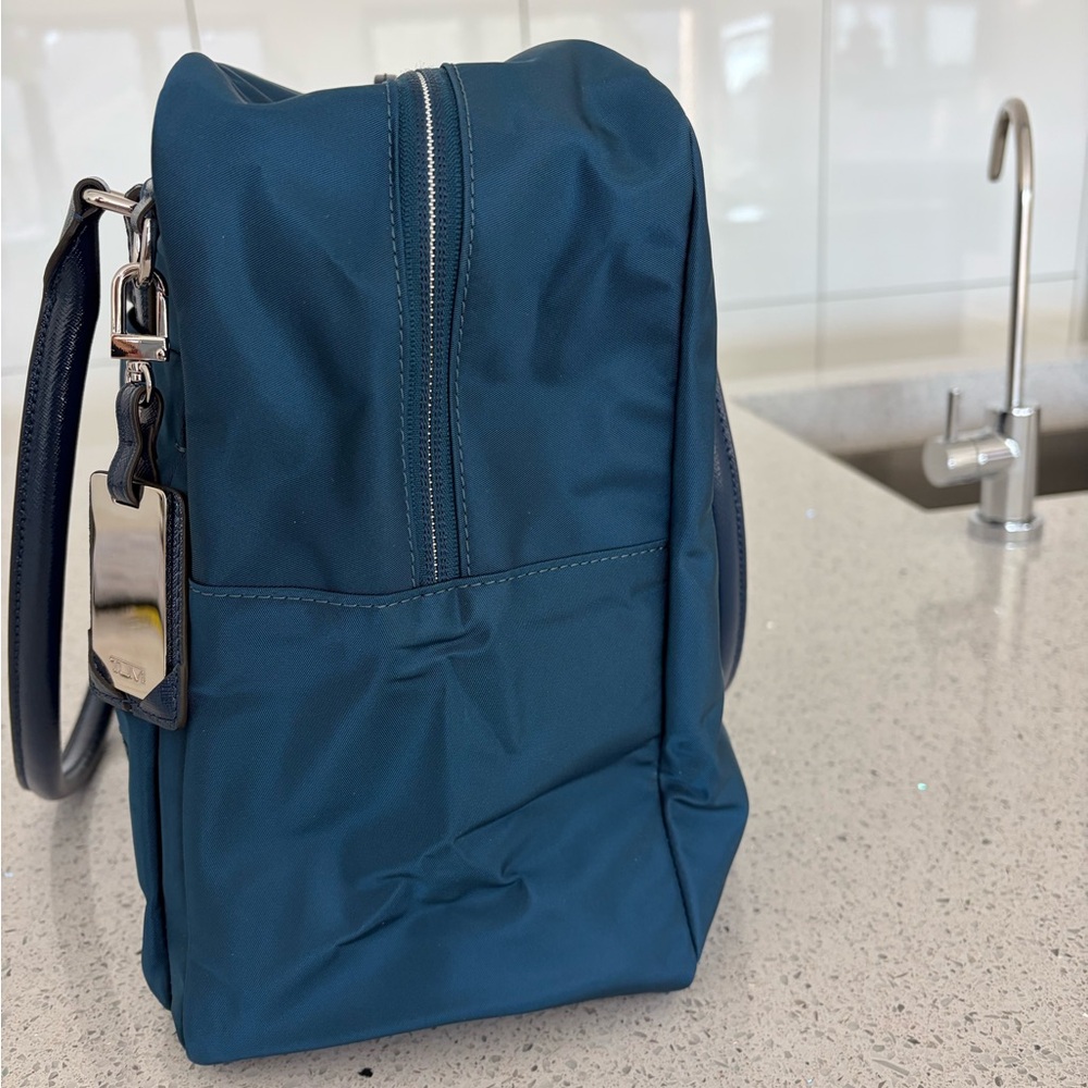 TUMI Navy Carry-On. Never used. Plastic still on inside zip. - Picture 6 of 7